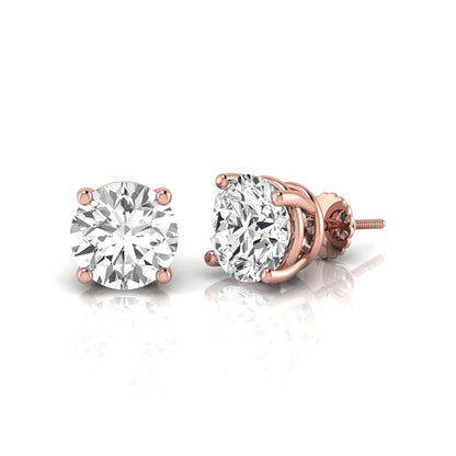 Round cut lab grown diamond stud earrings featuring a classic four-prong setting with secure screw back closure in a rose gold tone.