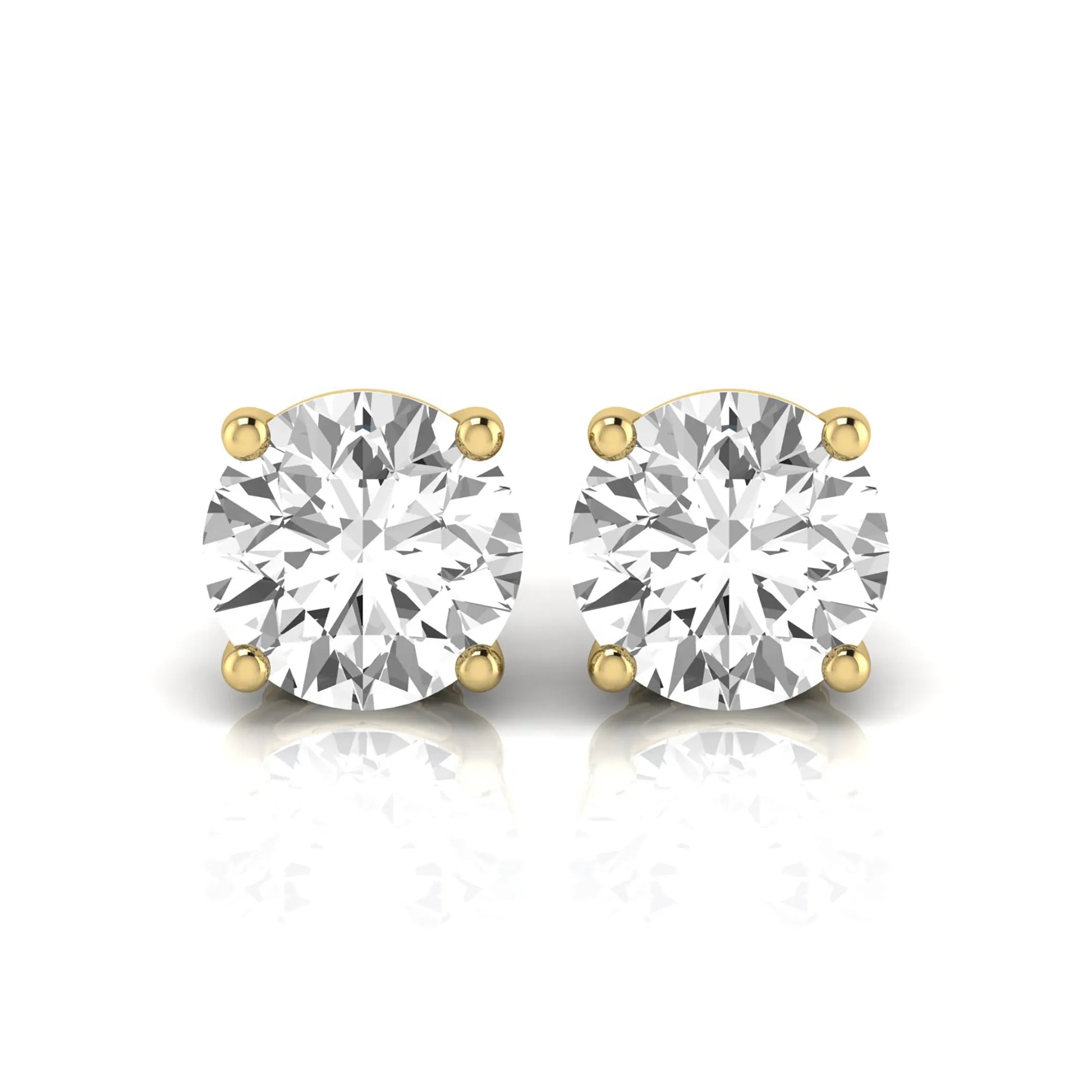 Round cut lab grown diamond stud earrings featuring a classic four-prong setting with secure screw back closure in a yellow gold tone.