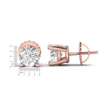 Round cut lab grown diamond solitaire stud earrings in a four-prong setting with secure screw back closure and rose gold tone.
