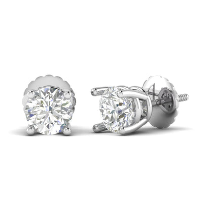 Round cut lab grown diamond solitaire stud earrings in a four-prong setting with secure screw back closure and white gold tone.