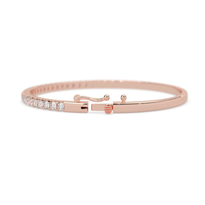 rose gold Round cut prong set lab grown diamond tennis bangle bracelet featuring a sleek polished design.