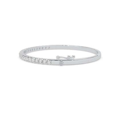 white gold Round cut prong set lab grown diamond tennis bangle bracelet featuring a sleek polished design.