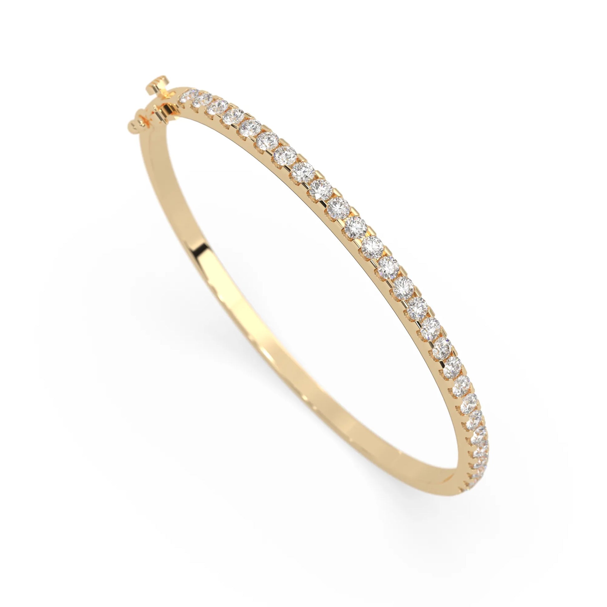 yellow gold Round cut prong set lab grown diamond tennis bangle bracelet featuring a sleek polished design.