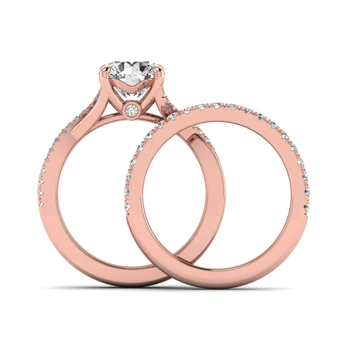 Round prong set lab grown diamond twisted shank bridal ring set featuring a 2.00 carat round center diamond with pavé round side diamonds in rose gold finish.
