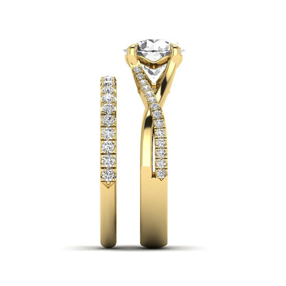 Round prong set lab grown diamond twisted shank bridal ring set featuring a 2.00 carat round center diamond with pavé round side diamonds in yellow gold finish.