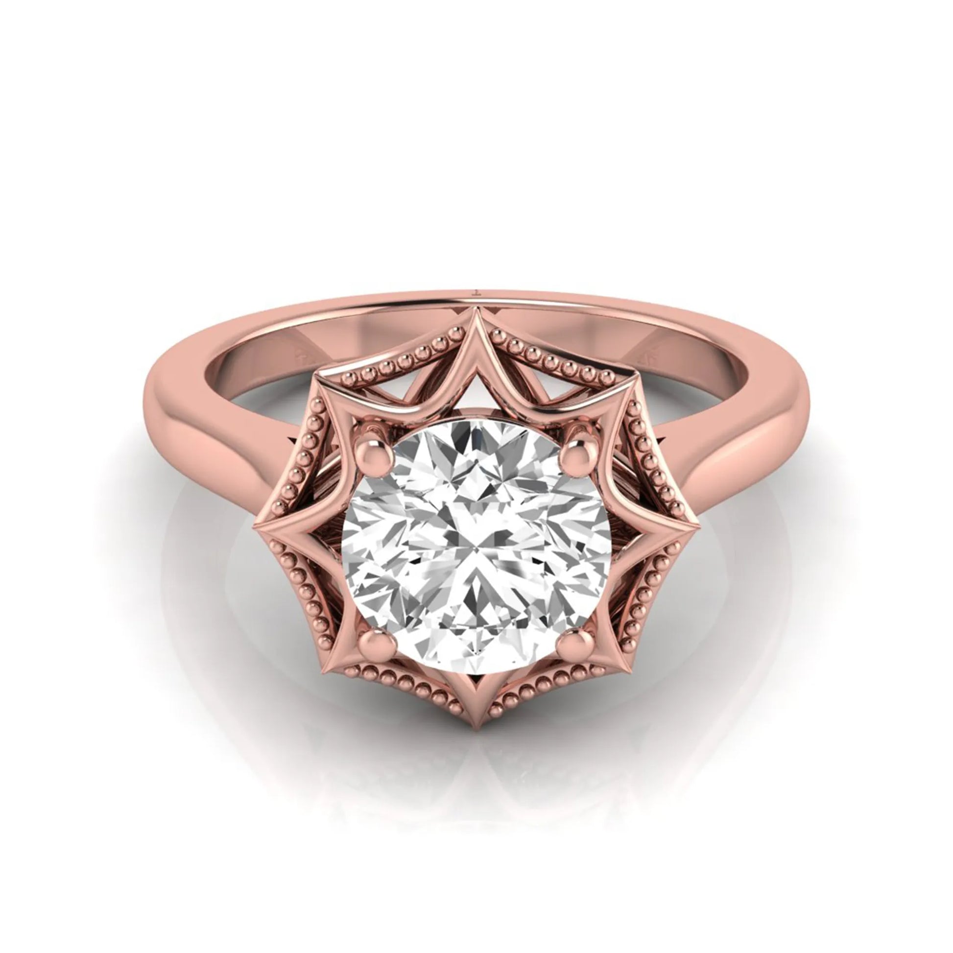 Round prong set lab grown diamond vintage solitaire engagement ring featuring a 1.28 carat round center diamond in an intricate starburst setting with milgrain detailing in rose gold