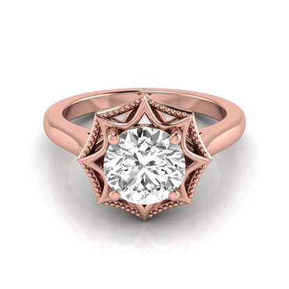 Round prong set lab grown diamond vintage solitaire engagement ring featuring a 1.28 carat round center diamond in an intricate starburst setting with milgrain detailing in rose gold