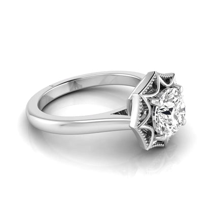 Round prong set lab grown diamond vintage solitaire engagement ring featuring a 1.28 carat round center diamond in an intricate starburst setting with milgrain detailing in white gold
