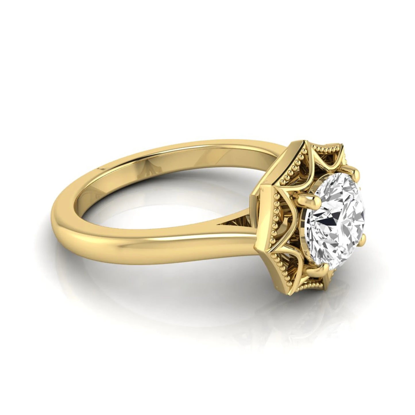 Round prong set lab grown diamond vintage solitaire engagement ring featuring a 1.28 carat round center diamond in an intricate starburst setting with milgrain detailing in yellow gold
