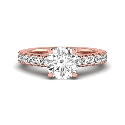IGI Certified 1.55 carat round cut lab grown diamond engagement ring with round side stone accents in rose gold.