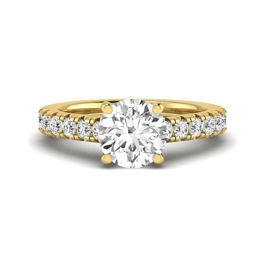 IGI Certified 1.55 carat round cut lab grown diamond engagement ring with round side stone accents in yellow gold.