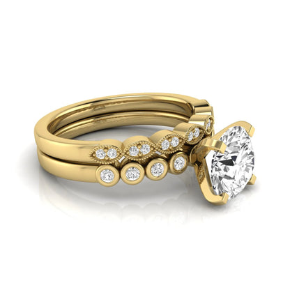 Round cut lab grown diamond bridal ring set featuring a four-prong solitaire engagement ring with a matching side stone wedding band accented by round bezel-set diamonds and vintage milgrain detailing.