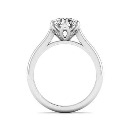 Round cut lab grown diamond solitaire engagement ring featuring a classic six-prong setting in white gold tone design.