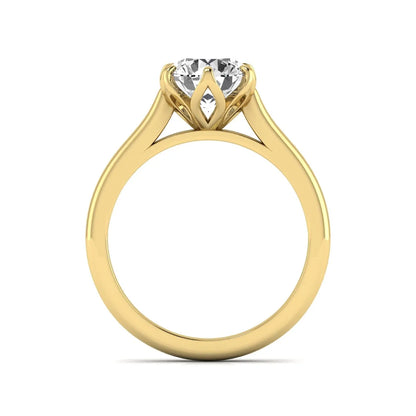 Round cut lab grown diamond solitaire engagement ring featuring a classic six-prong setting in yellow gold tone design.