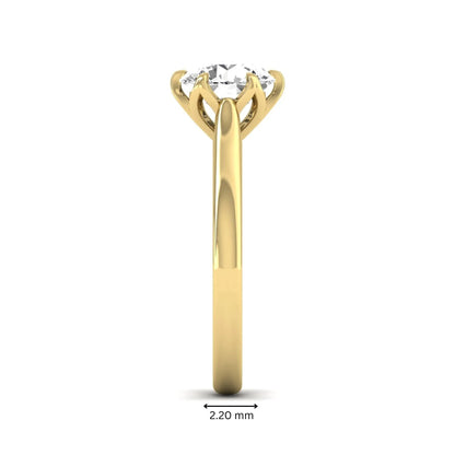 Round cut lab grown diamond solitaire engagement ring featuring a classic six-prong setting in yellow gold tone design.