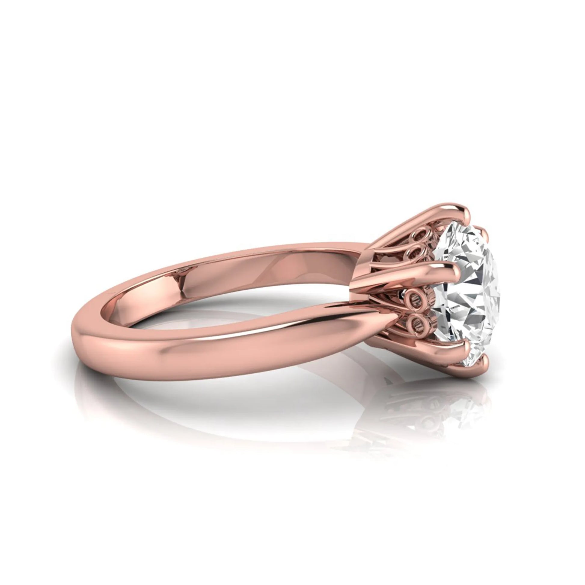Round cut lab grown diamond solitaire engagement ring featuring a classic six-prong setting with a polished rose gold finish band.