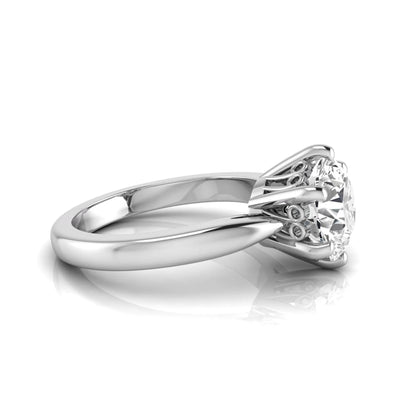 Round cut lab grown diamond solitaire engagement ring featuring a classic six-prong setting with a polished white gold finish band.