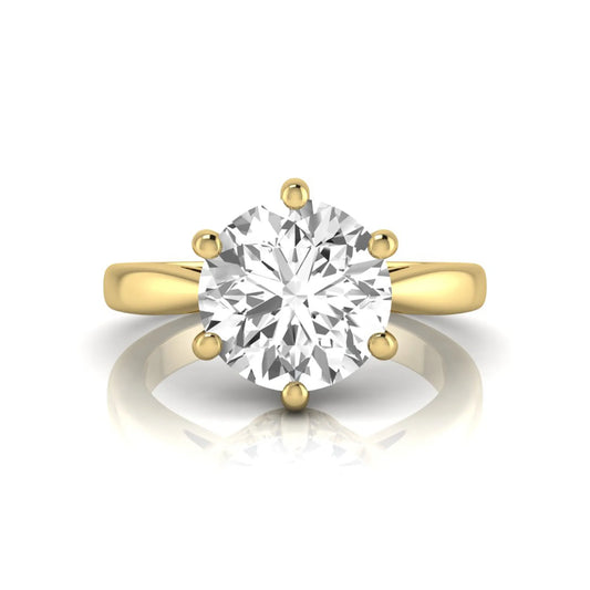 Round cut lab grown diamond solitaire engagement ring featuring a classic six-prong setting with a polished yellow gold finish band.