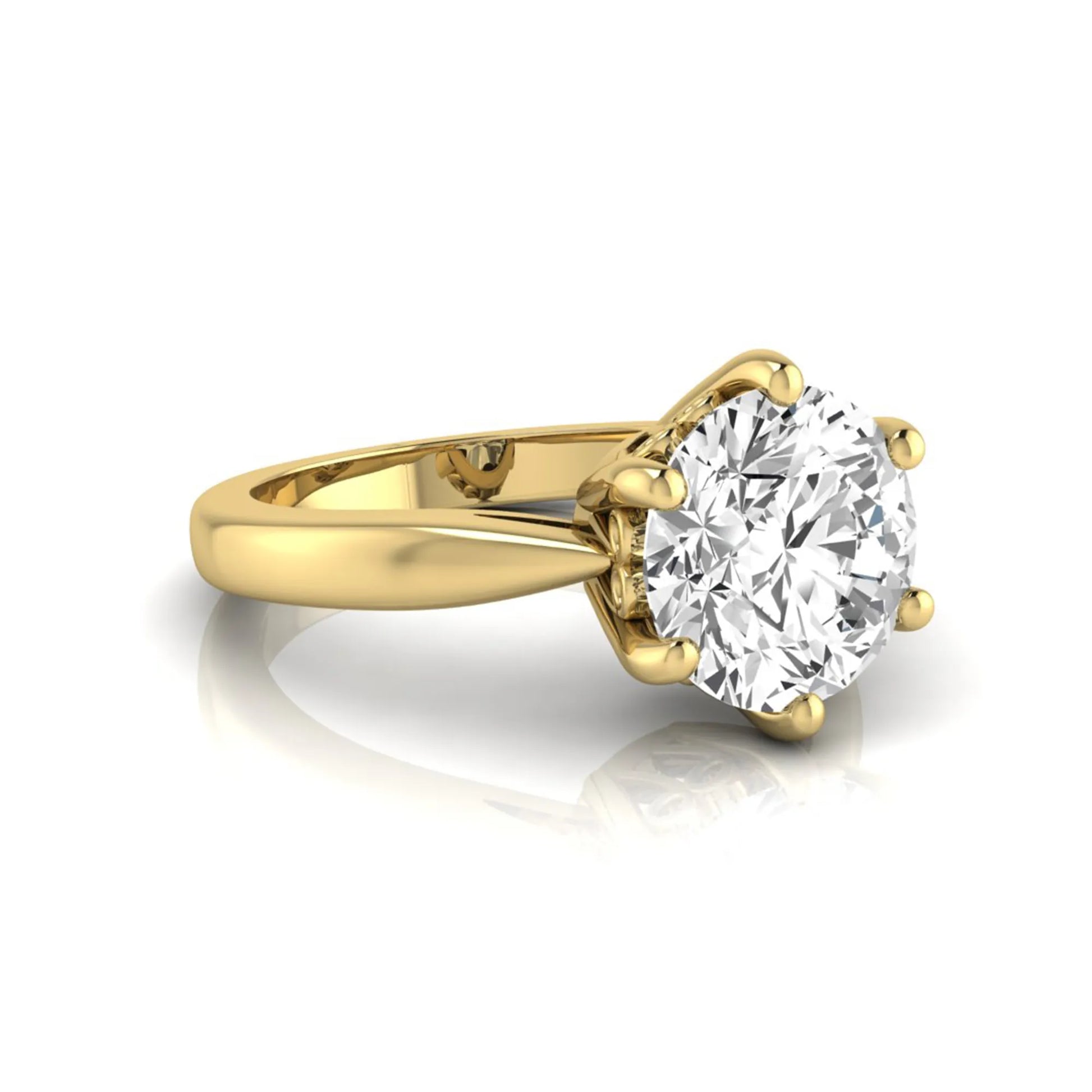 Round cut lab grown diamond solitaire engagement ring featuring a classic six-prong setting with a polished yellow gold finish band.