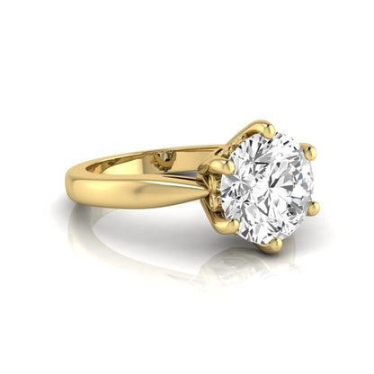 Round cut lab grown diamond solitaire engagement ring featuring a classic six-prong setting with a polished yellow gold finish band.