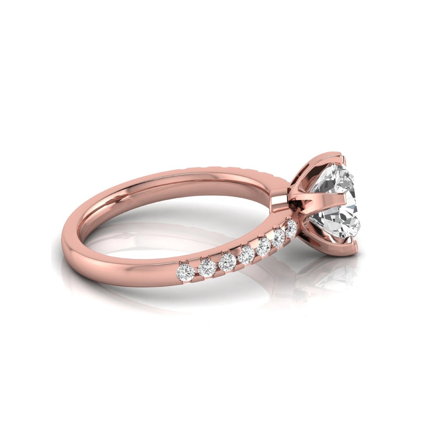 Round cut lab grown diamond solitaire engagement ring featuring a six-prong setting with a pavé diamond band in rose gold tone.