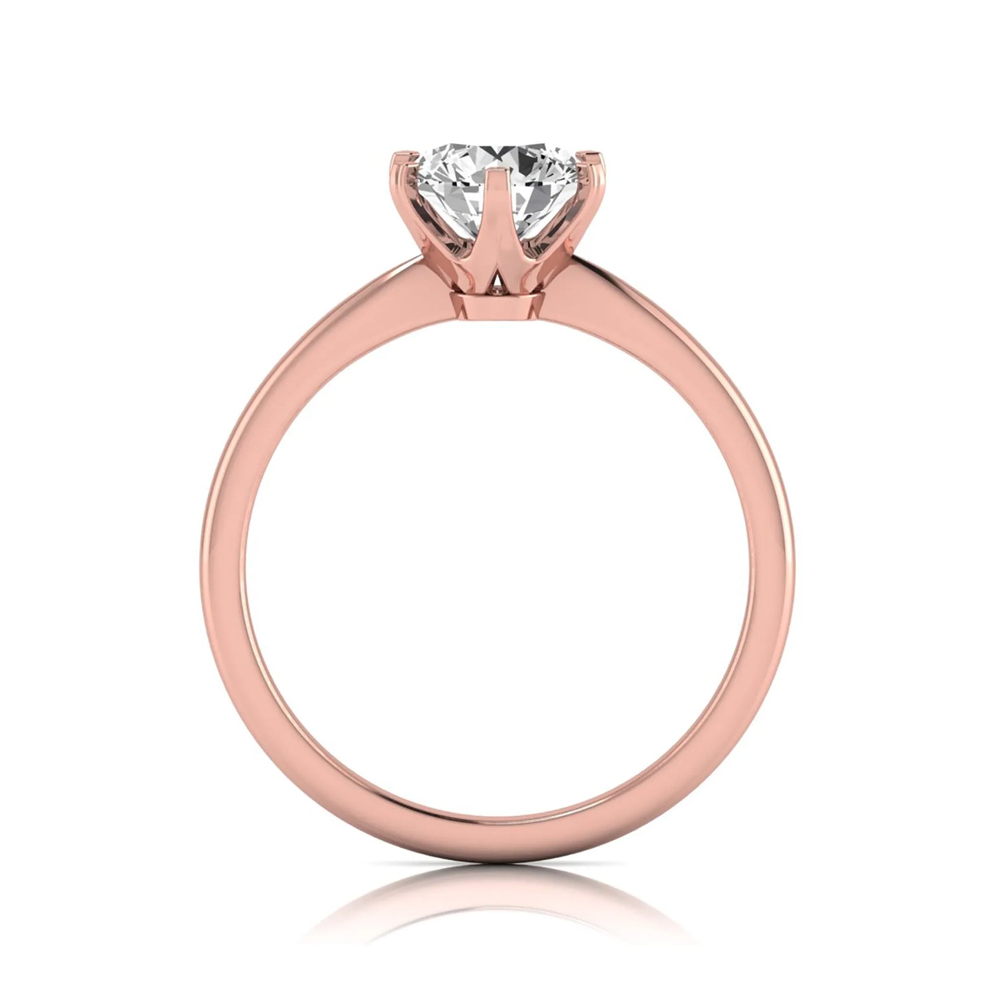 Round six prong set lab grown diamond solitaire engagement ring featuring a 1.28 carat round center diamond in a classic six-prong setting in rose gold