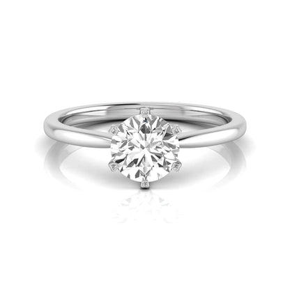 Round six prong set lab grown diamond solitaire engagement ring featuring a 1.28 carat round center diamond in a classic six-prong setting in white gold