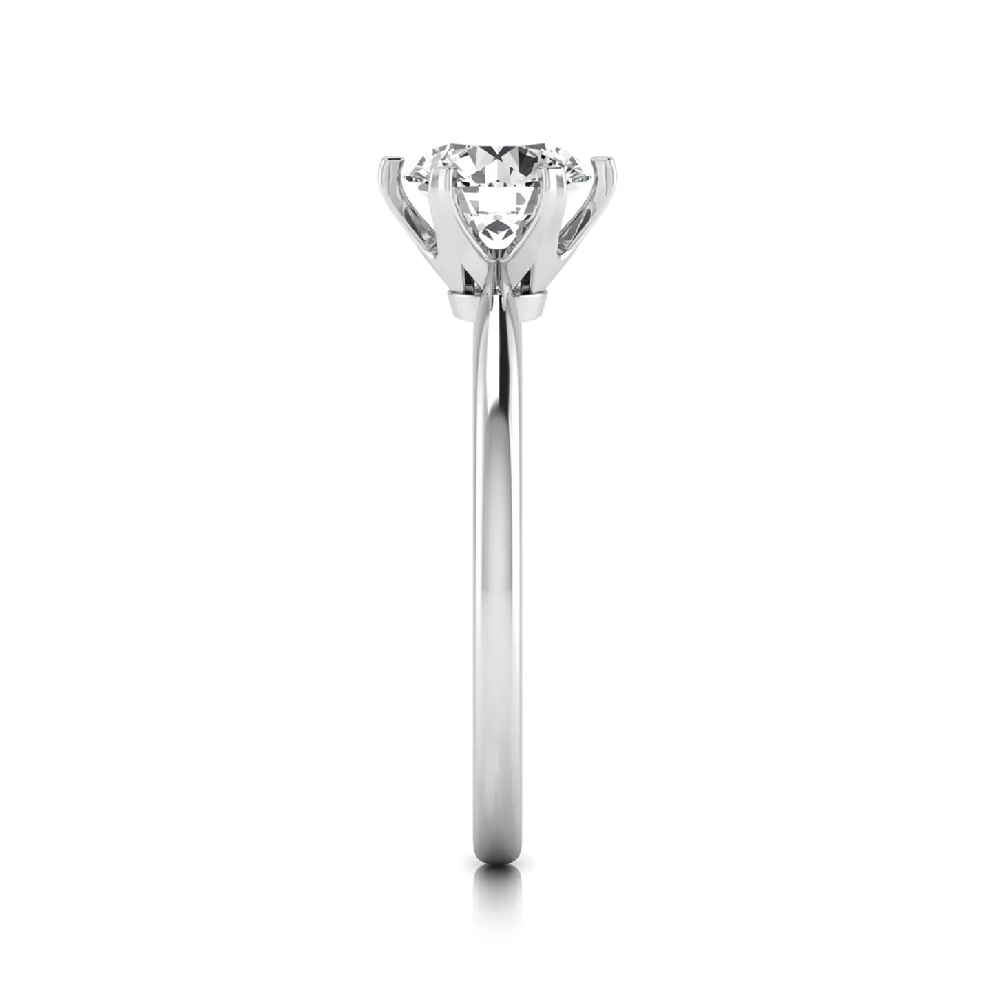 Round six prong set lab grown diamond solitaire engagement ring featuring a 1.28 carat round center diamond in a classic six-prong setting in white gold
