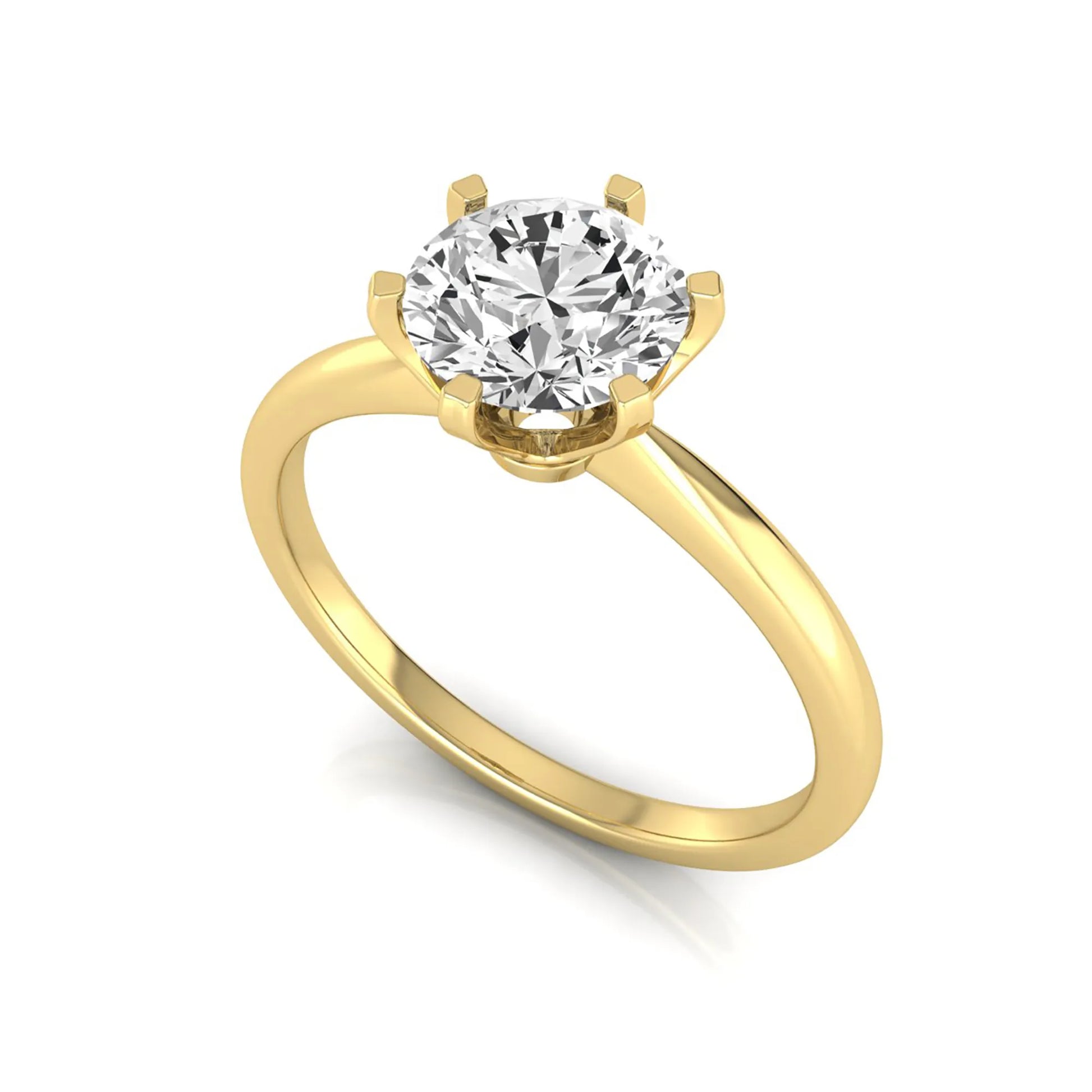 Round six prong set lab grown diamond solitaire engagement ring featuring a 1.28 carat round center diamond in a classic six-prong setting in yellow gold