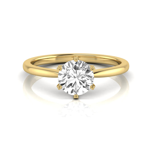 Round six prong set lab grown diamond solitaire engagement ring featuring a 1.28 carat round center diamond in a classic six-prong setting in yellow gold