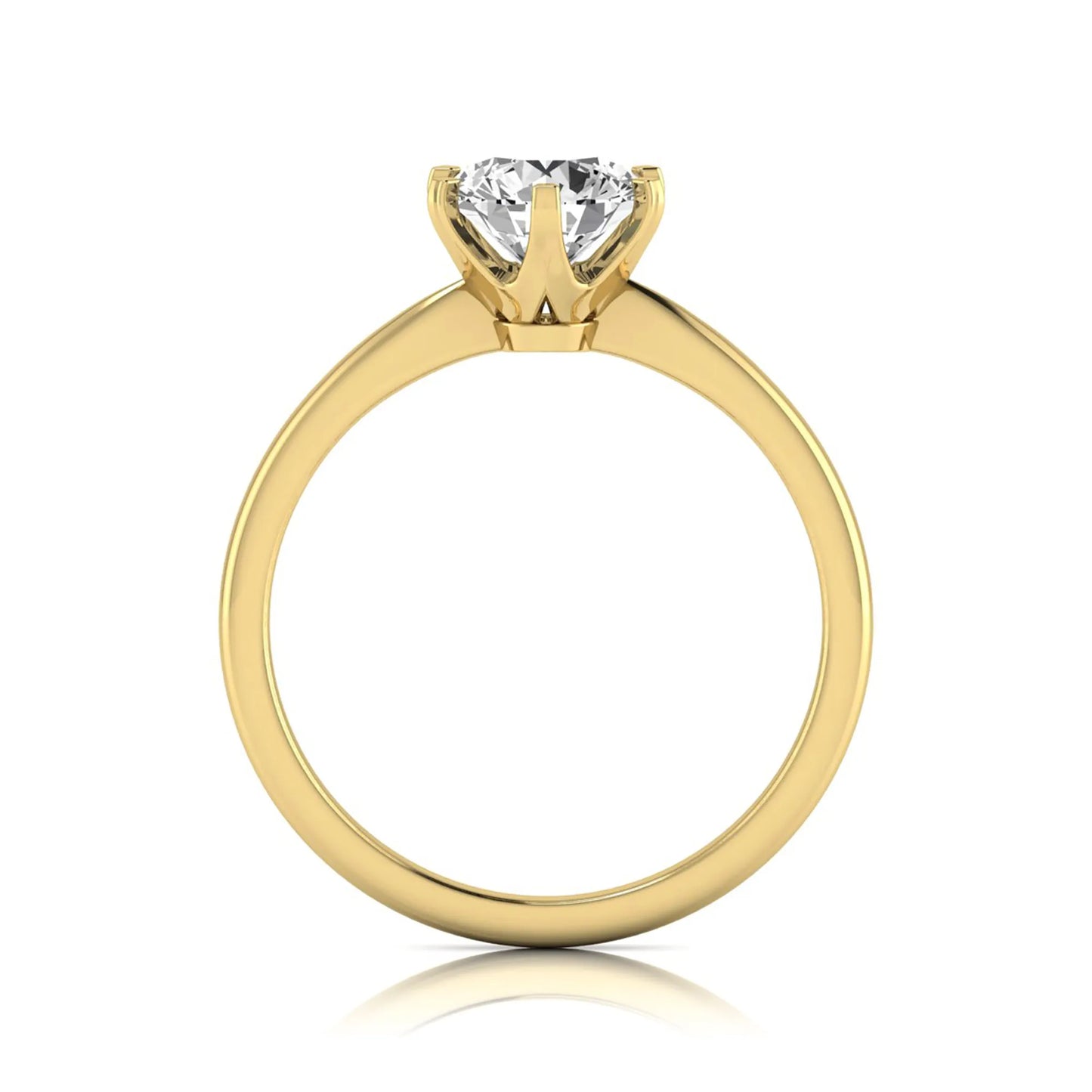 Round six prong set lab grown diamond solitaire engagement ring featuring a 1.28 carat round center diamond in a classic six-prong setting in yellow gold