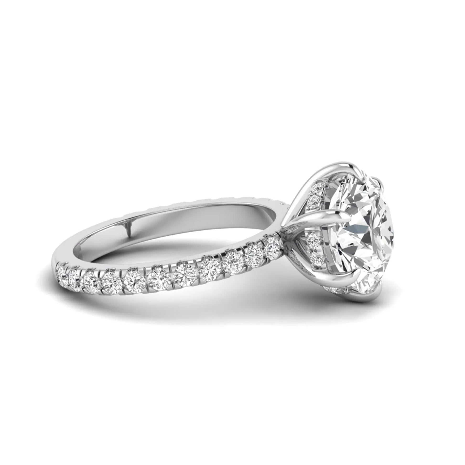 Round cut six prong solitaire lab grown diamond engagement ring with pavé band in white gold design