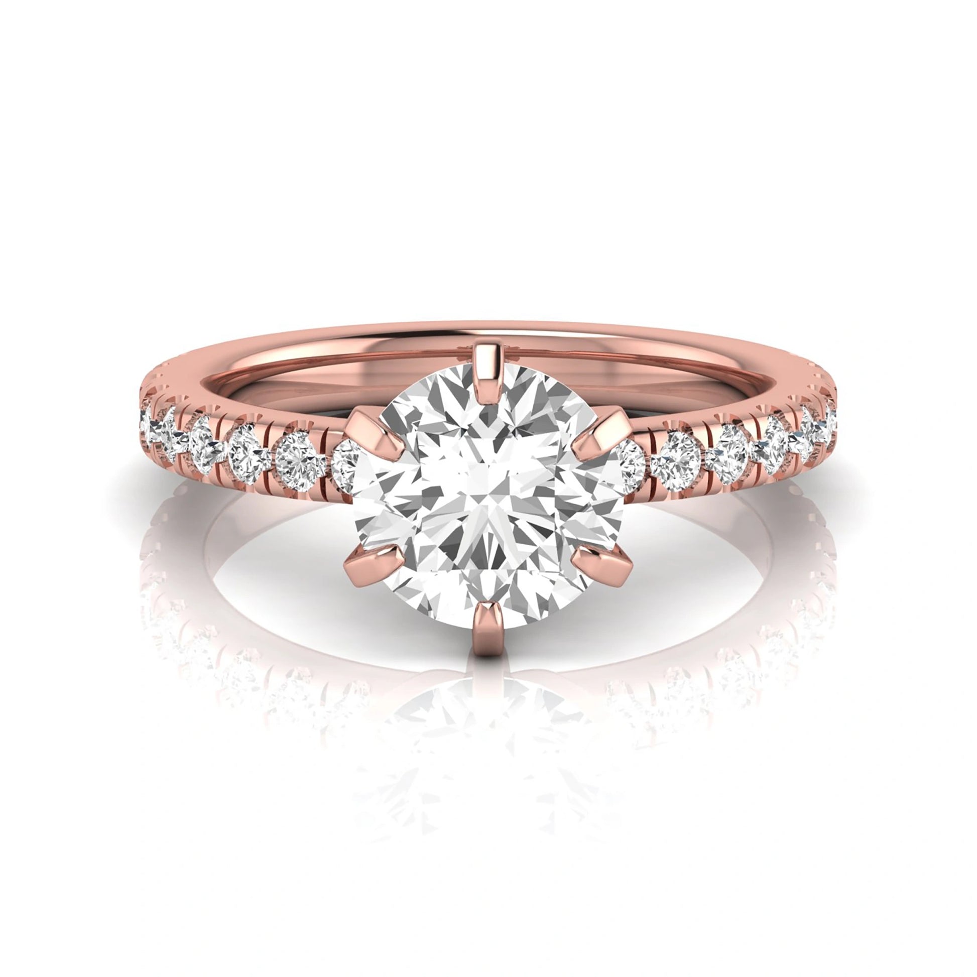 Round cut lab grown diamond engagement ring featuring a six-prong solitaire setting with a pavé accent band and polished rose gold tone finish.