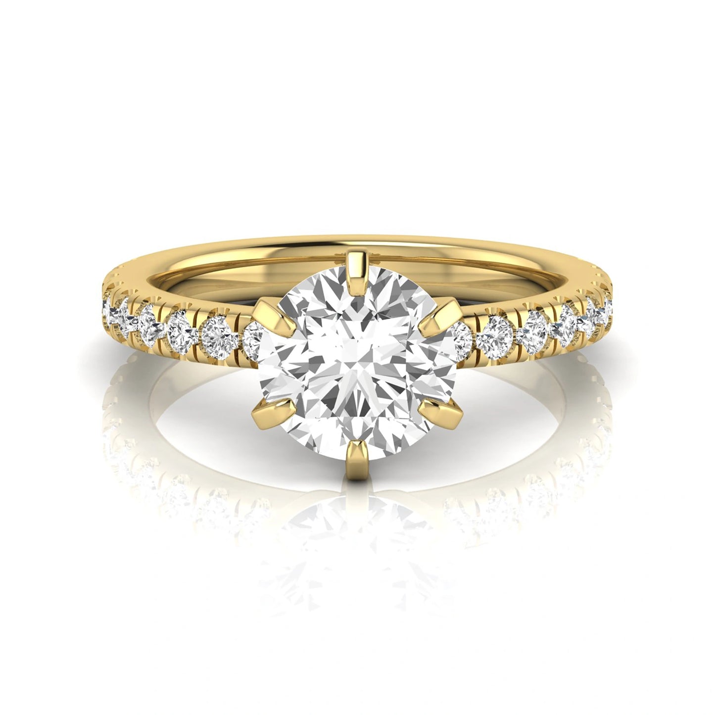 Round cut lab grown diamond engagement ring featuring a six-prong solitaire setting with a pavé accent band and polished yellow gold tone finish.