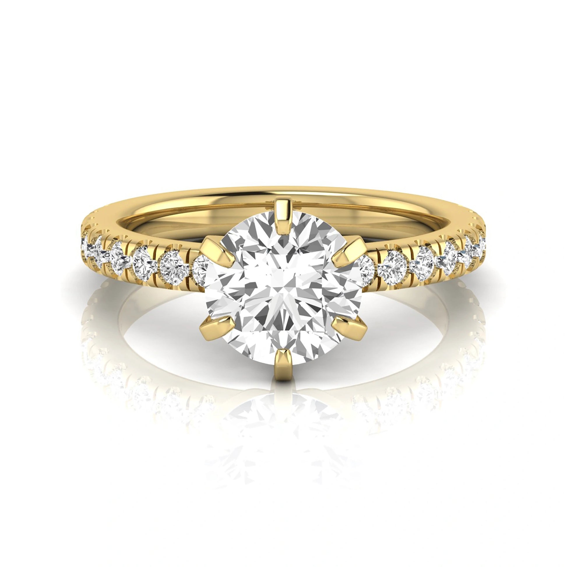 Round cut lab grown diamond engagement ring featuring a six-prong solitaire setting with a pavé accent band and polished yellow gold tone finish.