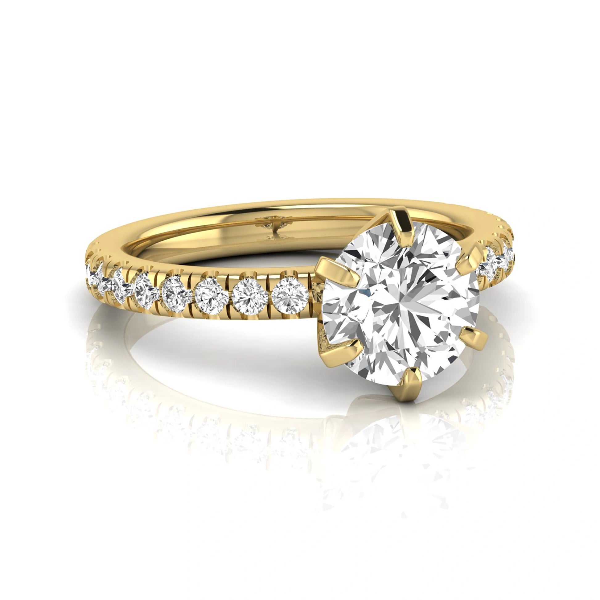 Round cut lab grown diamond engagement ring featuring a six-prong solitaire setting with a pavé accent band and polished yellow gold tone finish.
