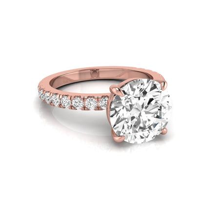 Round cut lab grown diamond engagement ring featuring a 3.87 carat IGI certified center diamond in a four-prong setting with round accent diamonds on a rose gold band.