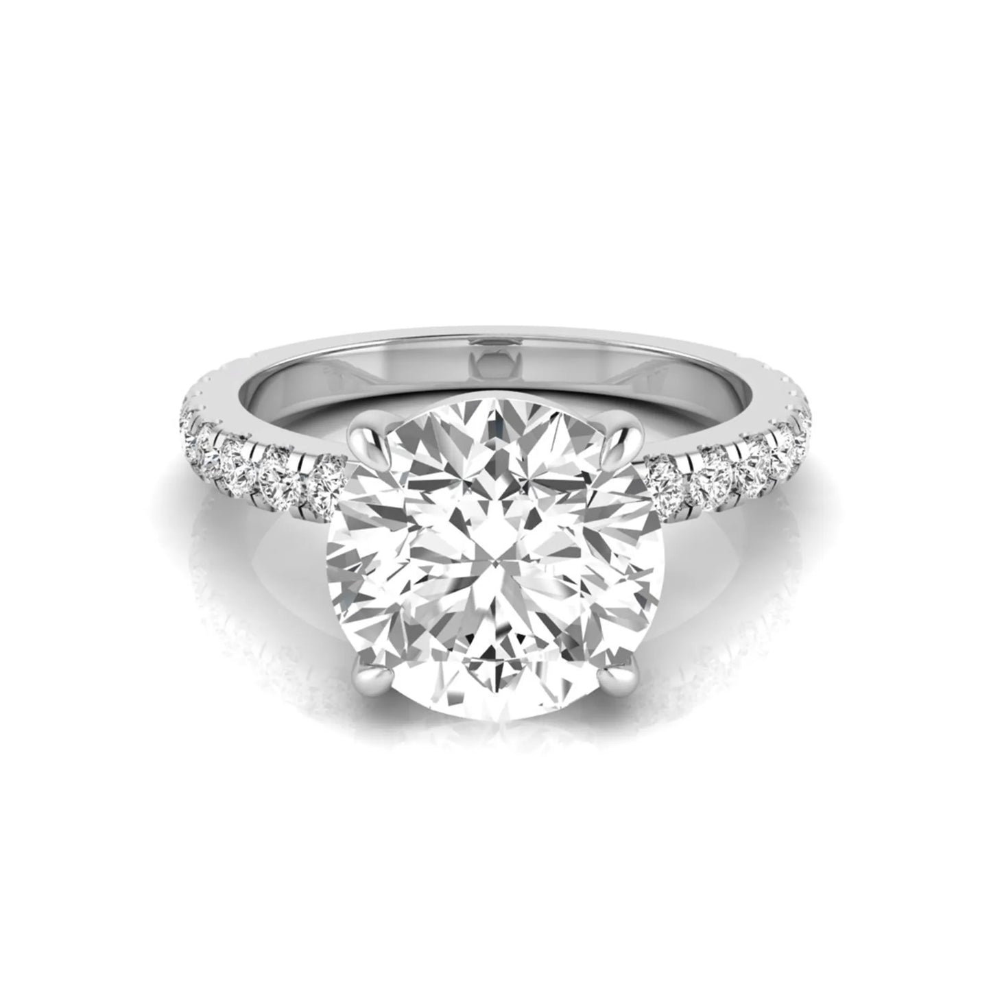 Round cut lab grown diamond engagement ring featuring a 3.87 carat IGI certified center diamond in a four-prong setting with round accent diamonds on a white gold band.