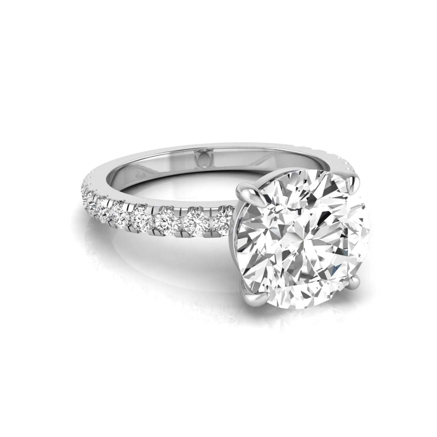 Round cut lab grown diamond engagement ring featuring a 3.87 carat IGI certified center diamond in a four-prong setting with round accent diamonds on a white gold band.