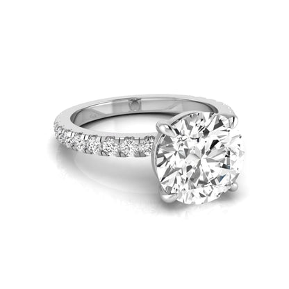Round cut lab grown diamond engagement ring featuring a 3.87 carat IGI certified center diamond in a four-prong setting with round accent diamonds on a white gold band.