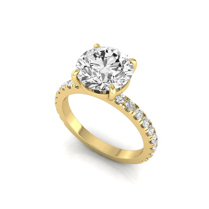 Round cut lab grown diamond engagement ring featuring a 3.87 carat IGI certified center diamond in a four-prong setting with round accent diamonds on a yellow gold band.