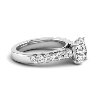 Round solitaire accent lab grown diamond engagement ring featuring a 2.50 carat round brilliant IGI certified center diamond with round accent diamonds on a white gold band.
