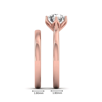 IGI Certified 1.67 carat round cut lab grown diamond solitaire bridal ring set with matching plain wedding band in rose gold.