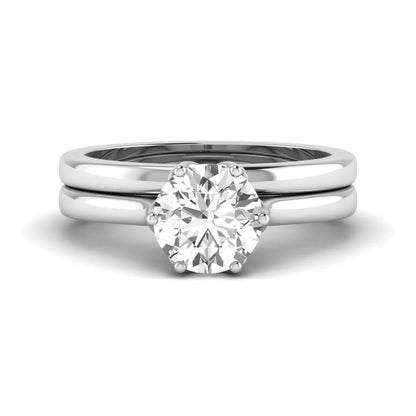 IGI Certified 1.67 carat round cut lab grown diamond solitaire bridal ring set with matching plain wedding band in white gold.