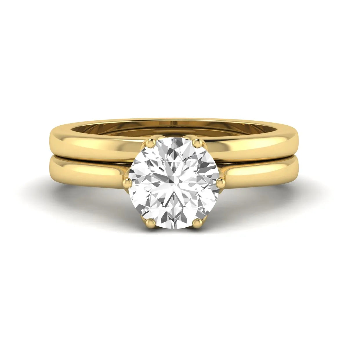 IGI Certified 1.67 carat round cut lab grown diamond solitaire bridal ring set with matching plain wedding band in yellow gold.