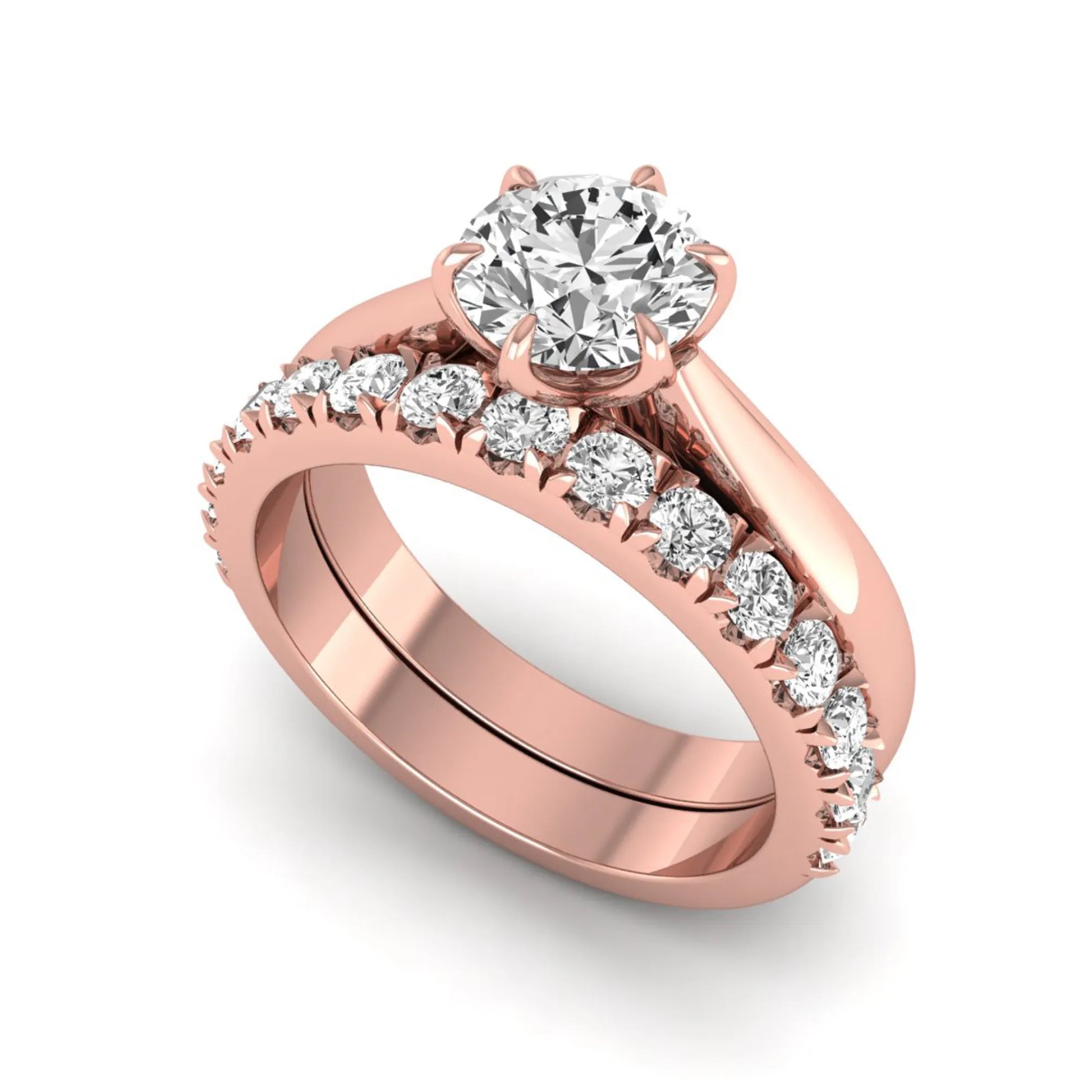 Round cut lab grown diamond solitaire bridal ring set featuring a six-prong engagement ring with a matching shared-prong round diamond wedding band in rose gold tone design.