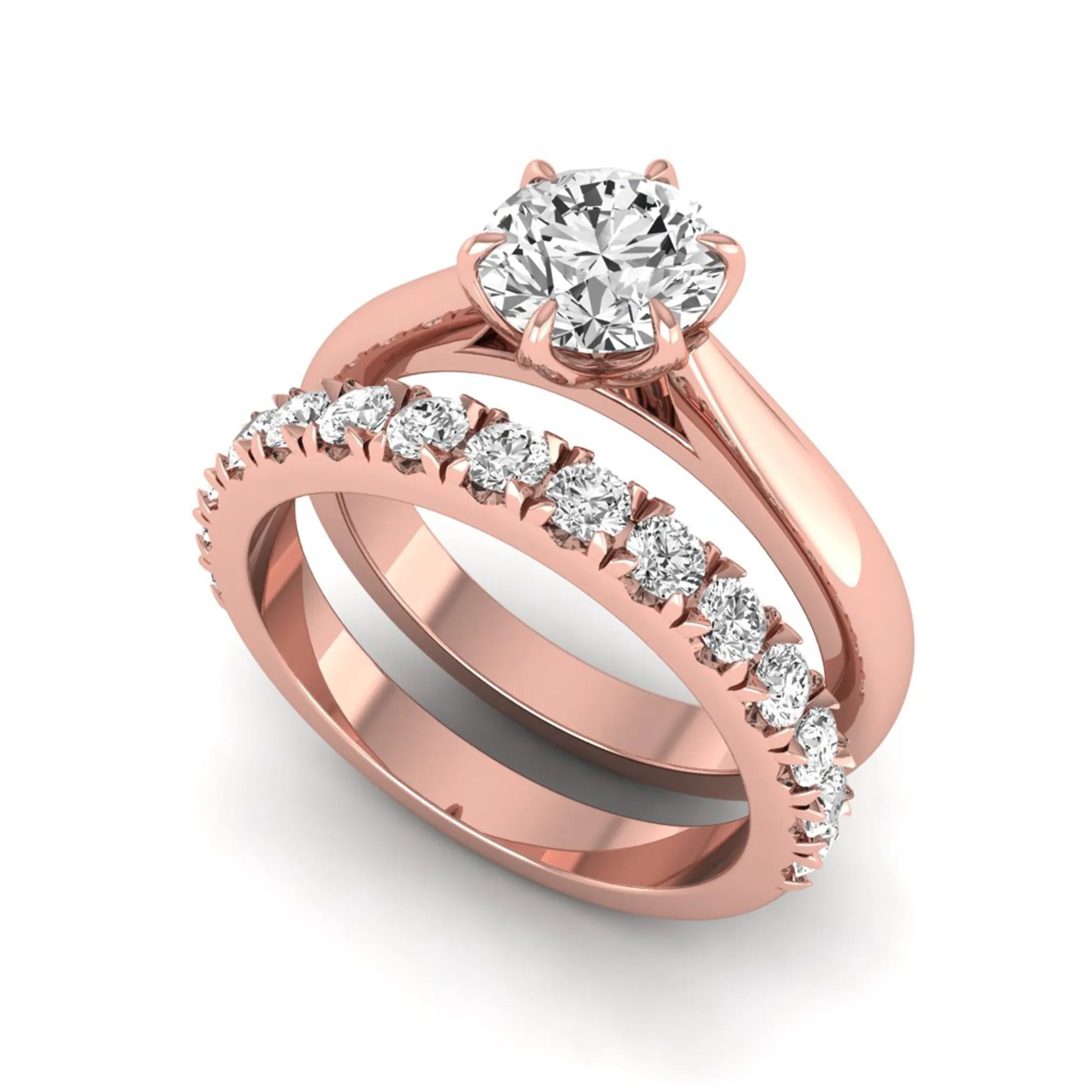 Round cut lab grown diamond solitaire bridal ring set featuring a six-prong engagement ring with a matching shared-prong round diamond wedding band in rose gold tone design.