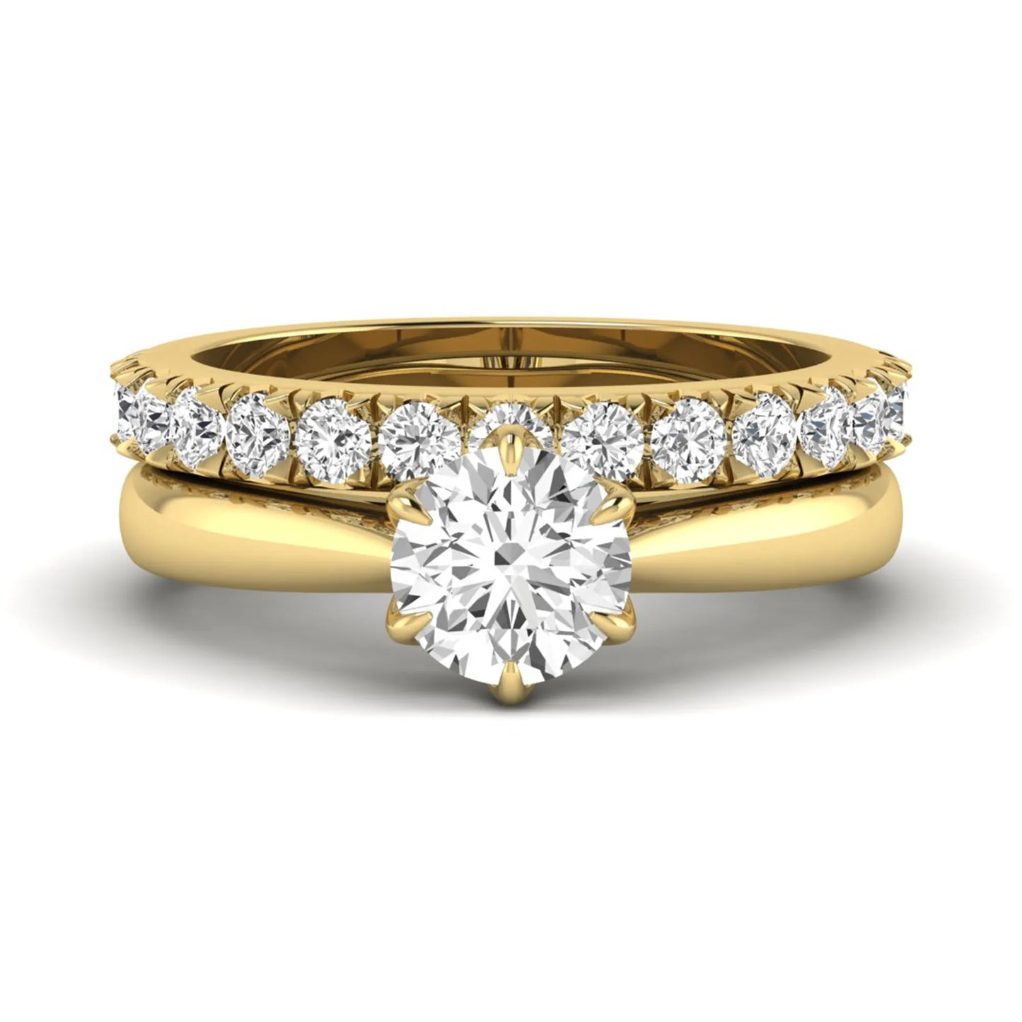 Round cut lab grown diamond solitaire bridal ring set featuring a six-prong engagement ring with a matching shared-prong round diamond wedding band in yellow gold tone design.