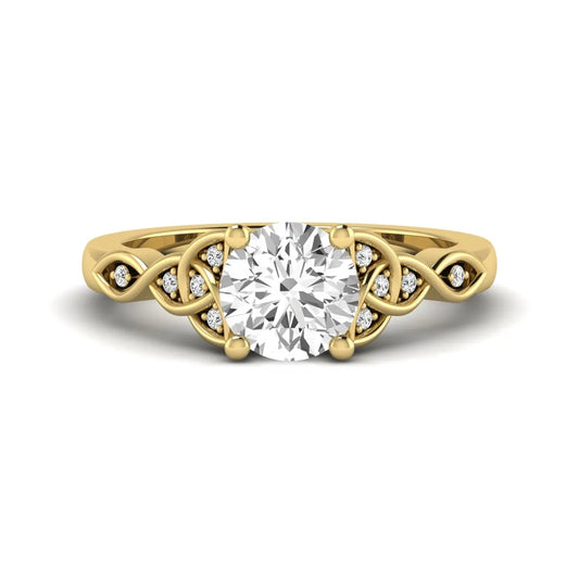 Round cut lab grown diamond solitaire engagement ring featuring a four-prong center diamond with an intricate Celtic knot-inspired band and round accent diamonds in a yellow gold finish.