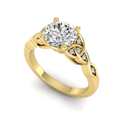 Round cut lab grown diamond solitaire engagement ring featuring a four-prong center diamond with an intricate Celtic knot-inspired band and round accent diamonds in a yellow gold finish.